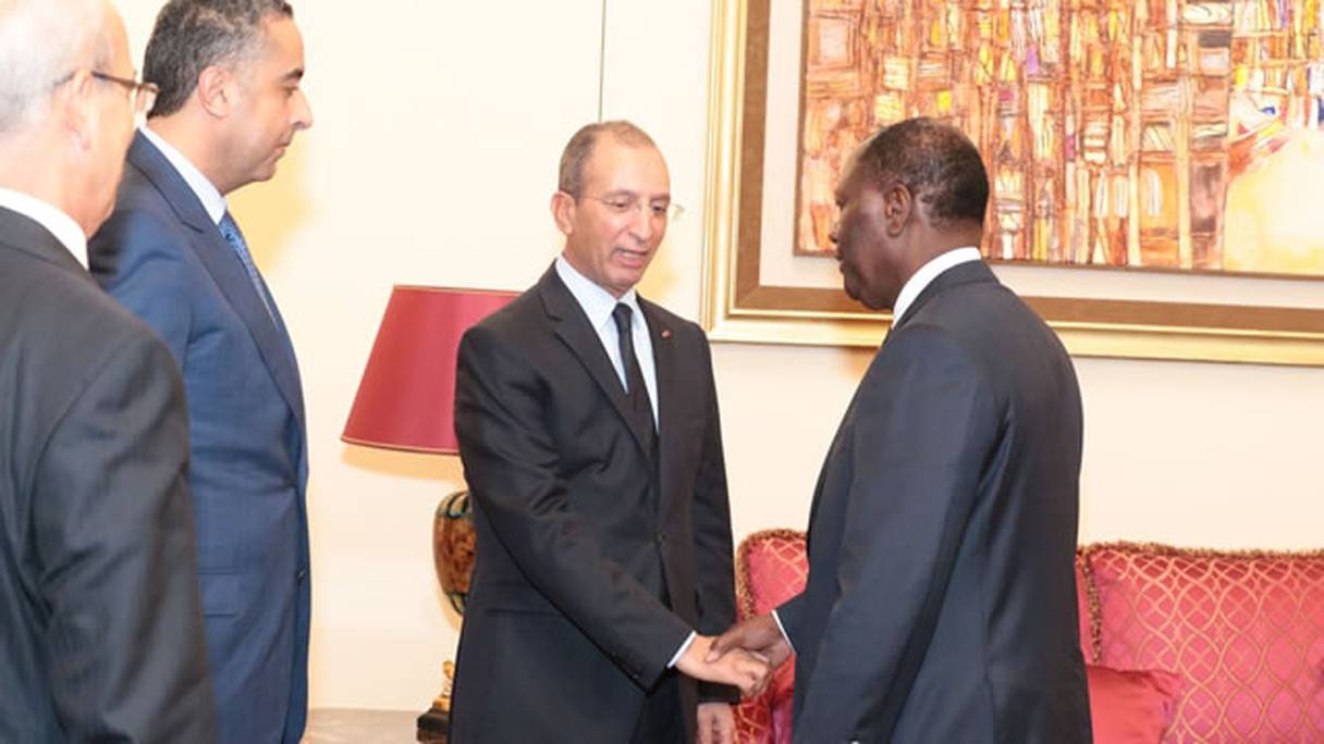 Mohamed Hassad et Abdellatif Hammouchi reçus en audience par le président Alassane Ouattara.
