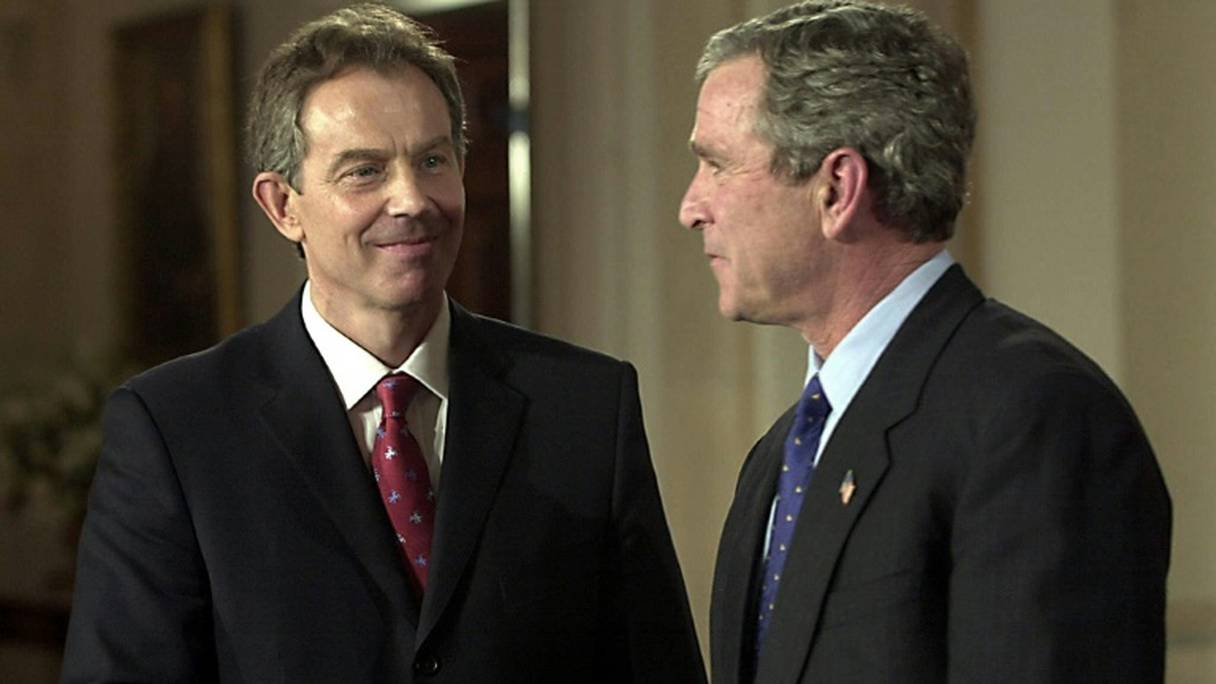 Le Premier ministre britannique Tony Blair et le président américain George W. Bush à la Maison-Blanche, le 31 janvier 2003.
