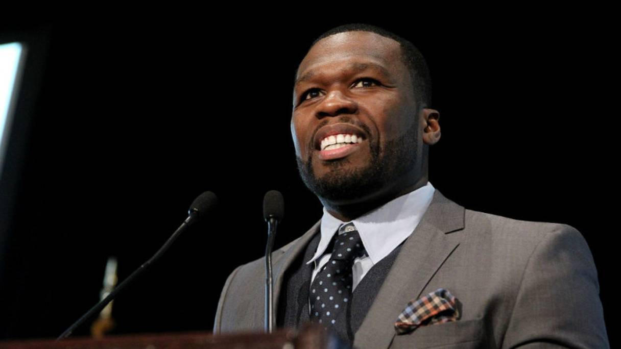50 Cent en mode homme d'affaires.
