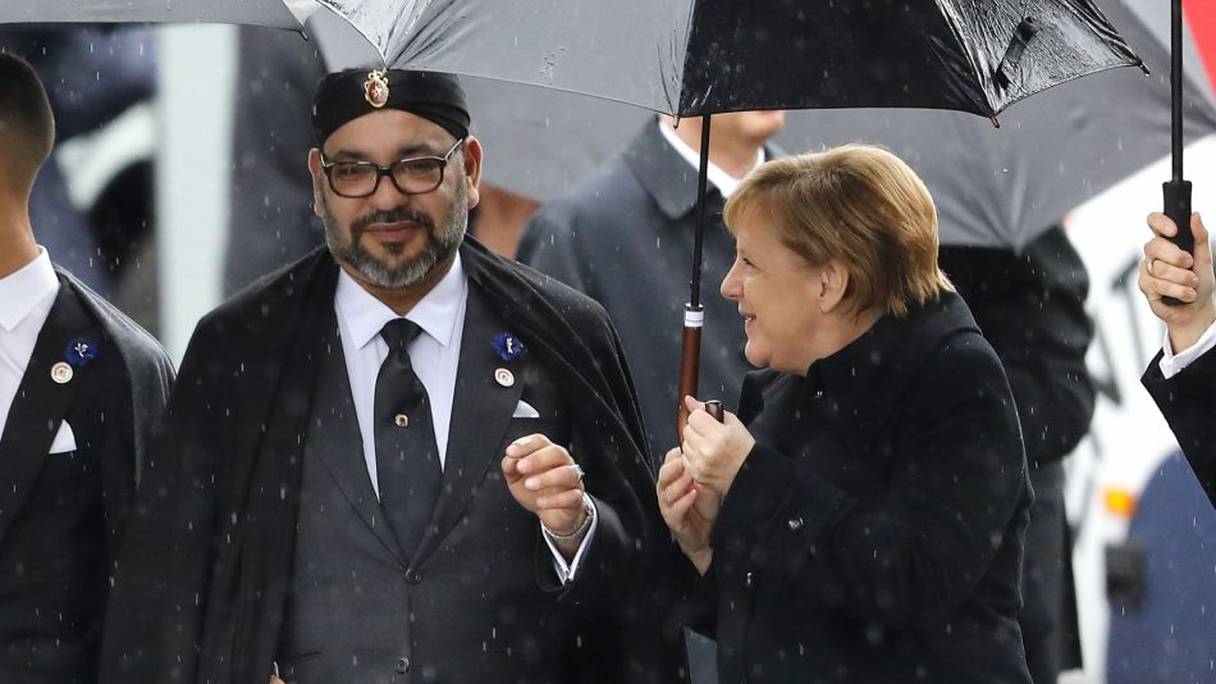 Le roi Mohammed VI et Angela Merkel lors du Centenaire de l'Armistice à Paris.
