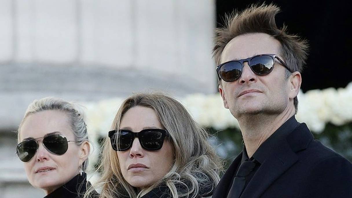 Laeticia Hallyday, la femme de Johnny Hallyday, sa fille Laura Smet et son fils David Hallyday aux funérailles du chanteur à La Madeleine, le 9 décembre 2017 à Paris.
