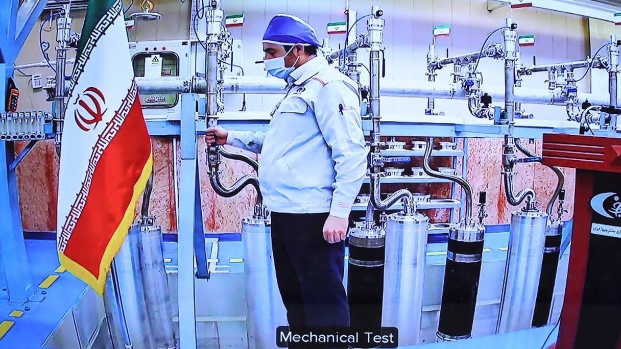 Capture d'écran d'une vidéoconférence, montrant un moteur dans l'usine d'enrichissement d'uranium de Natanz, en Iran, lors d'une cérémonie dirigée par le président Hassan Rohani, à Téhéran (photo fournie le 10 avril 2021). 
