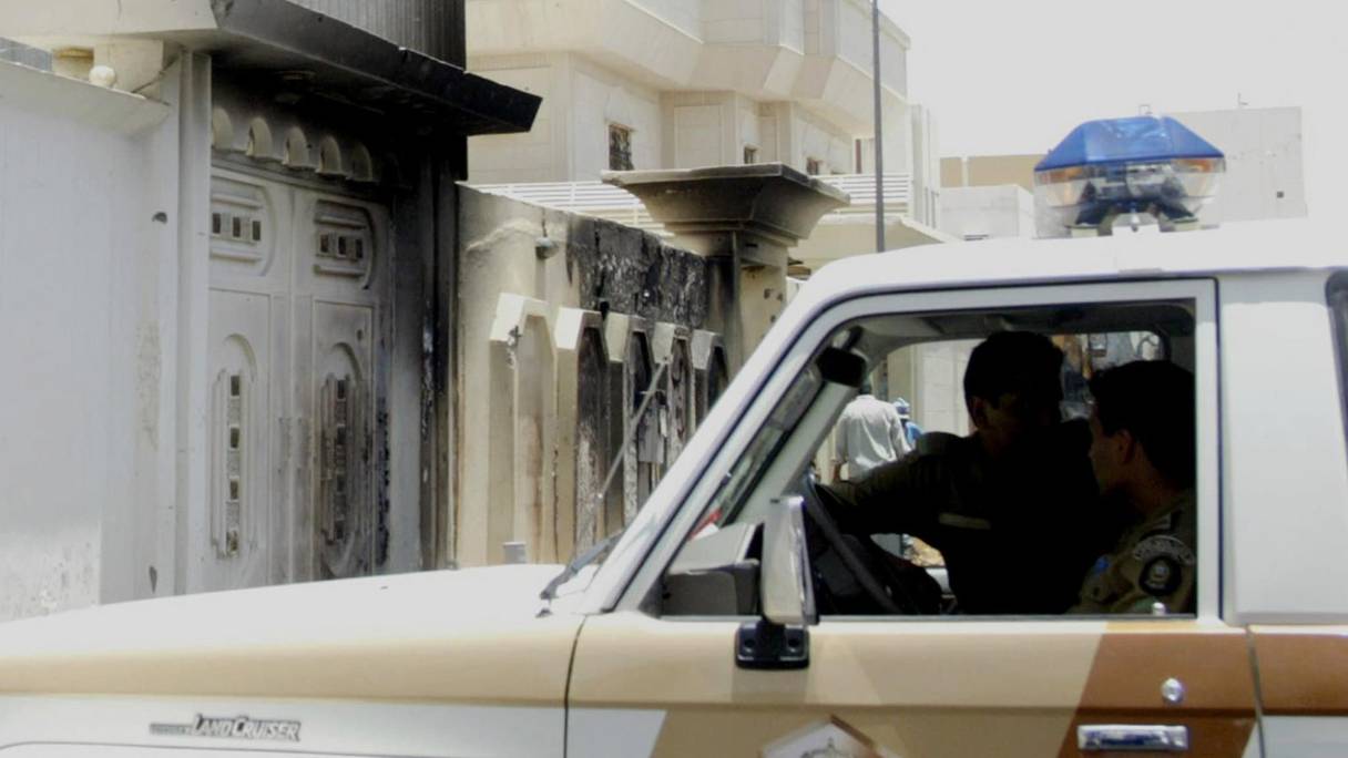 Des policiers à bord de leur véhicule à Jeddah, en Arabie Saoudite.
