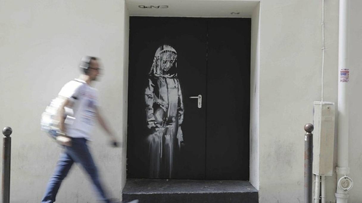 L'oeuvre de l'artiste britannique Banksy dérobée au Bataclan.
