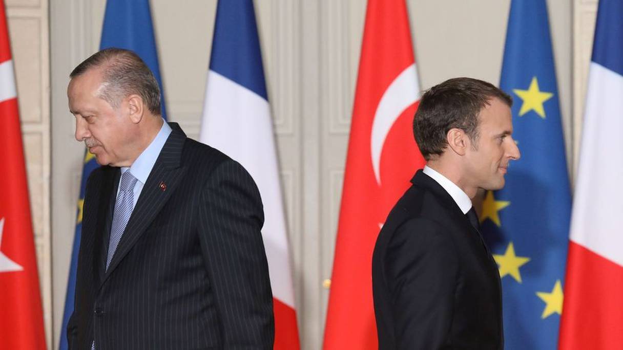 Les présidents turc Recep Tayyip Erdogan (G) et français Emmanuel Macron lors d'une conférence de presse conjointe à l'Elysée, le 5 janvier 2018 à Paris.
