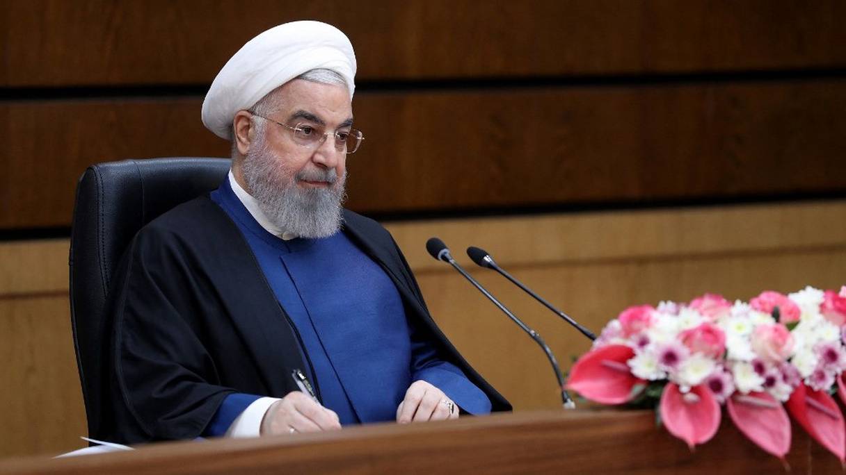 Le président iranien Hassan Rohani prononce un discours à l'occasion de la Journée nationale de la technologie nucléaire iranienne, à Téhéran, le 10 avril 2021. 
