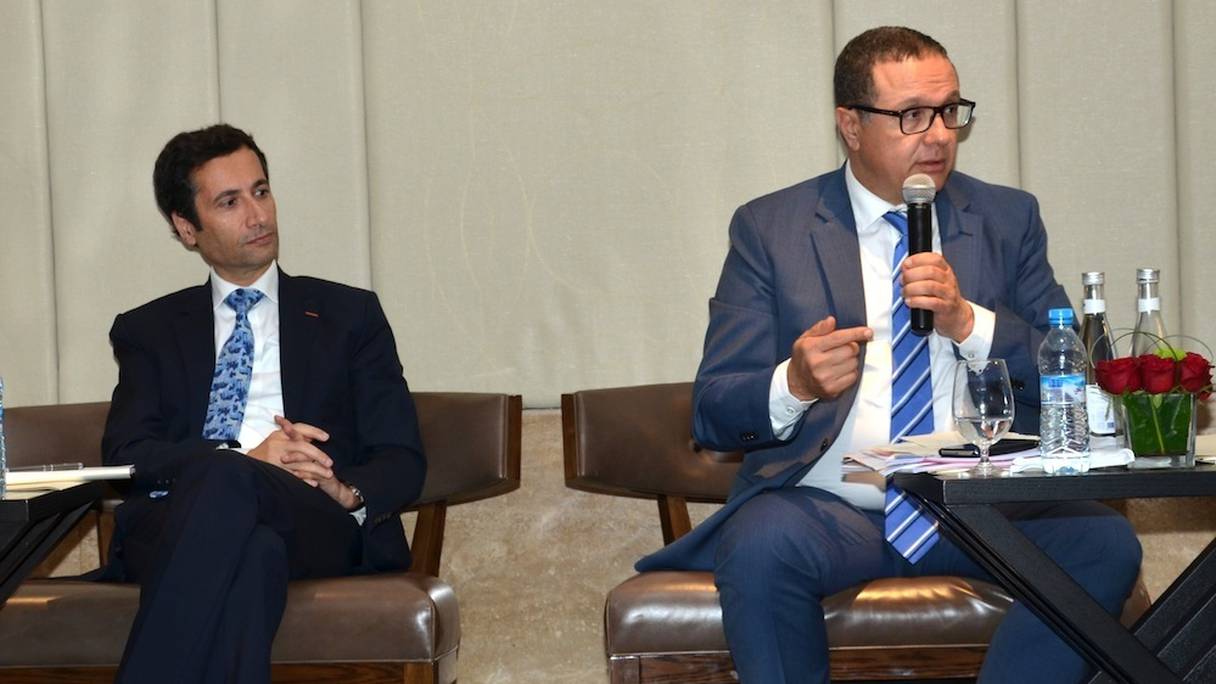 Mohamed Benchaâboun, PDG du groupe Banque Populaire et Mohamed Boussaïd, ministre de l'Economie et des finances. 
