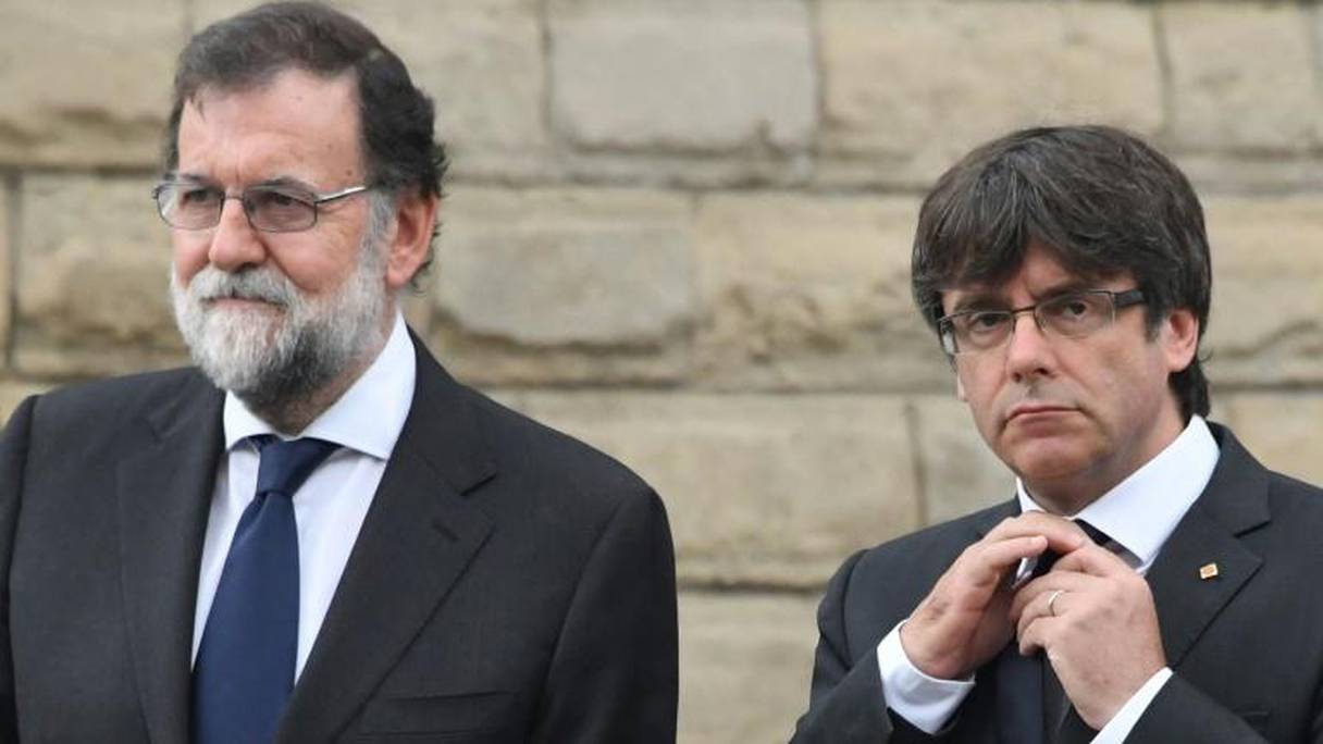 Le Premier ministre espagnol Mariano Rajoy et le président catalan Carles Puigdemont.
