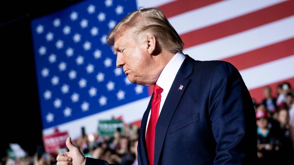 Le président américain Donald Trump lors d'un meeting de campagne à Battle Creek, dans le Michigan, le 18 décembre 2019, alors que la Chambre des représentants vote sa mise en accusation.
